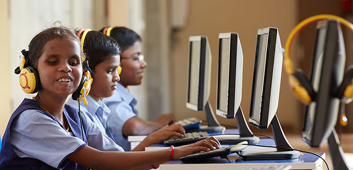 This image shows a few blind girls learning computer. Indian government wants to call these girls divyang.