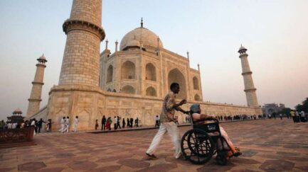 divyang jan : a wheelchair user at Taj Mahal in India