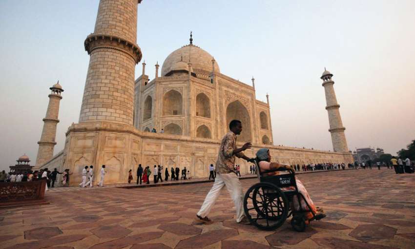 divyang jan : a wheelchair user at Taj Mahal in India