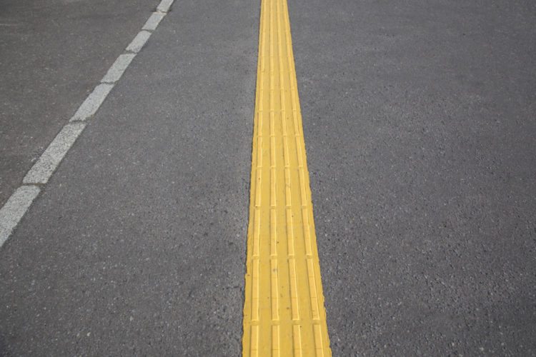 tactile paving along stripes